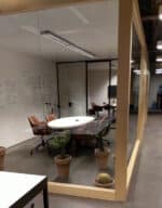 Betonlook eettafel ovaal Datil met matrixpoot