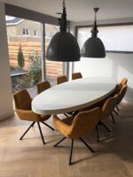 Betonlook eettafel ovaal Datil met matrixpoot