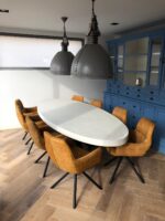 Betonlook eettafel ovaal Datil met matrixpoot