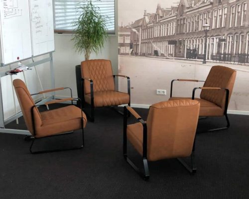 Fauteuils in de vergaderruimte Fauteuils in de vergaderruimte